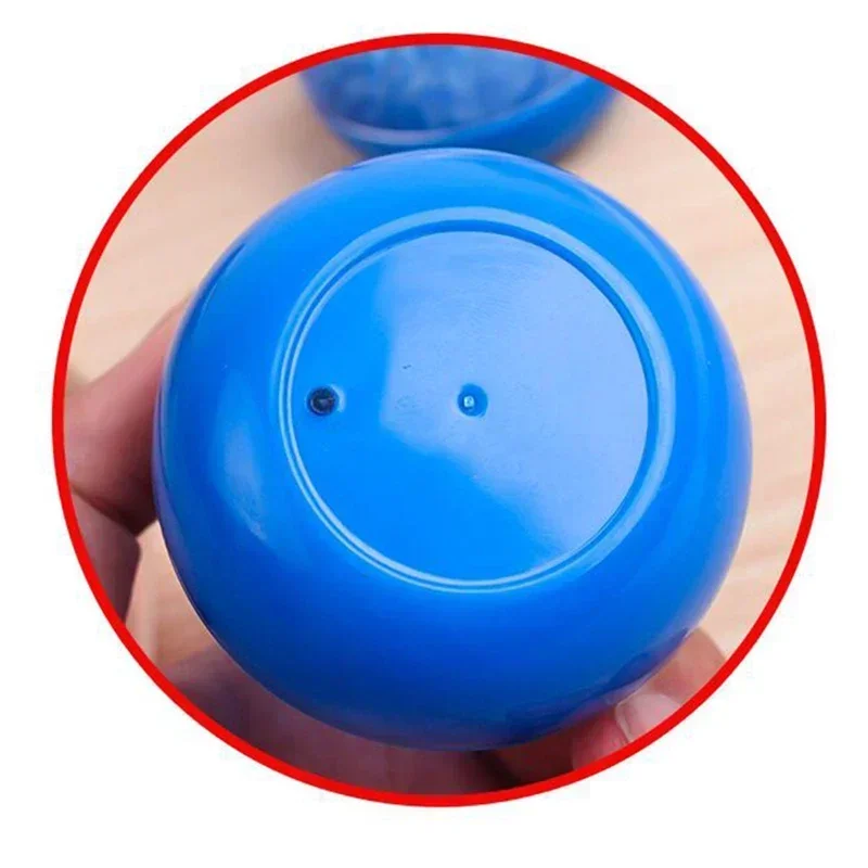 Vue de la base du timer liquide sensoriel coloris bleu — outil sensoriel stable