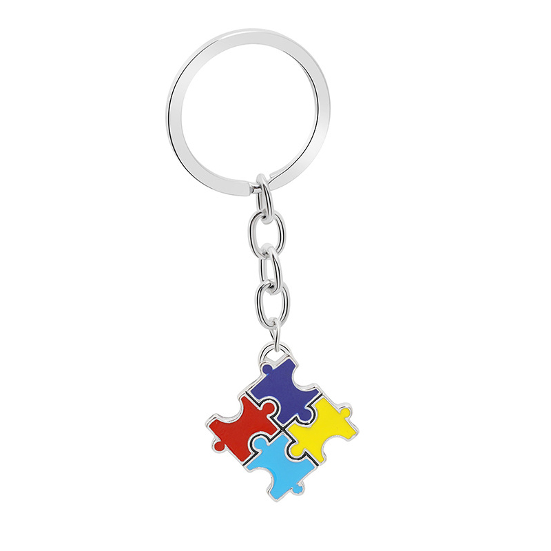 Porte-clés puzzle autisme en métal émaillé coloré