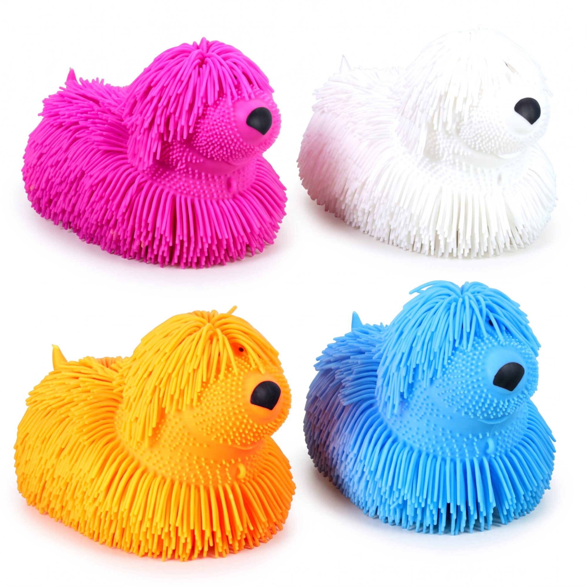 Quatre chiens sensoriels à filaments souples, rose, blanc, orange et bleu, posés côte à côte